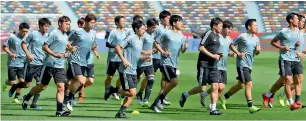  ??  ?? The Japanese team undergo a training session ahead of the Oman tie. —