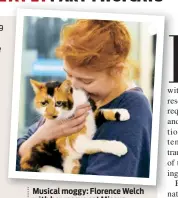  ??  ?? Musical moggy: Florence Welch with her rescue cat Missus