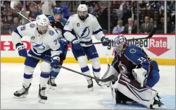  ?? JOHN LOCHER — THE ASSOCIATED PRESS ?? Colorado Avalanche goaltender Darcy Kuemper (35) stops a shot from Tampa Bay Lightning center Ross Colton (79) during the third period of Game 1of the Stanley Cup Final on Wednesday in Denver.