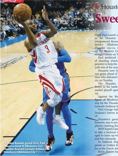  ?? Photo: IC ?? Houston Rockets guard Chris Paul shoots in front of Oklahoma City Thunder forward Carmelo Anthony on Tuesday in Oklahoma City.