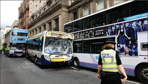  ??  ?? The No60 bus slammed into a car and then a number of buses after the incident in Renfield Street in Glasgow last July