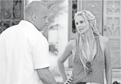  ?? MATT KENNEDY, UNIVERSAL STUDIOS ?? Dom (Vin Diesel) reclaims solid values in his post-Cipher (Charlize Theron) life in The Fate of the Furious.