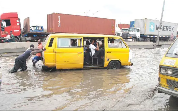  ??  ?? Flooding after the rain on Apapa-Oshodi Expressway in Lagos...recently