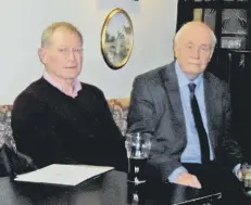  ??  ?? Researcher and presenter John Gibson after his Bismarck presentati­on (right) to Boldon History Society with friend John Douglas, who helped develop the support graphics.
