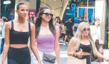  ?? ?? Monika Saade, Isabella Saade and Amy Farah in Pitt St Mall in the Sydney CBD. Picture: Gaye Gerard