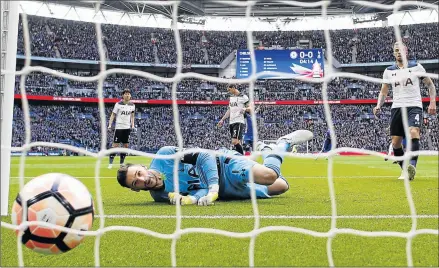  ?? Picture: AFP ?? LOOK OF DESPAIR: Tottenham Hotspurs French goalkeeper Hugo Lloris fails to stop a free-kick by Chelsea's Brazilian midfielder Willian to make it 1-0 during the FA Cup semifinal match between the two sides at Wembley stadium in London