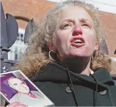  ??  ?? SPEAKING OUT: Dorothy Grady, top, holds a sign for her late sister; Ruth Rollins, middle, of Boston wipes tears as she speaks of her son who was shot; and Ilyse Levine-Kanji, bottom, who lost her father to gun violence, holds his photo.