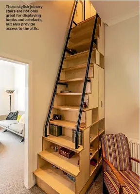  ??  ?? These stylish joinery stairs are not only great for displaying books and artefacts, but also provide access to the attic.