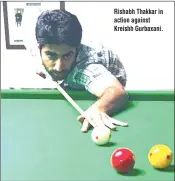  ??  ?? Rishabh Thakkar in action against Kreishh Gurbaxani.