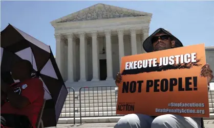  ?? ?? Sunny Neelam takes part in a vigil against the death penalty on 29 June. Photograph: Alex Wong/Getty Images