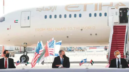  ?? AFP ?? Fromleft: US Treasury Secretary Steven Mnuchin, Israeli Prime Minister Benjamin Netanyahu and Obaid Humaid Al Tayer, UAE Minister of State for Financial Affairs, during their talks at Ben Gurion Airport near Tel Aviv, yesterday.