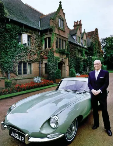  ??  ?? History house: Jaguar founder Sir William Lyons with a 1966 E-Type at Wappenbury Hall