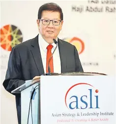  ??  ?? Yeoh delivering the welcoming remarks at the opening of the 4th Sarawak Business and Investment Summit. — Photo by Muhammad Rais Sanusi.