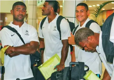  ?? Photo: FRU Media ?? Fijian Warriors captain Enele Malele (bowing right) with teamamates at the Nadi Internatio­nal Airport on April 30, 2023.