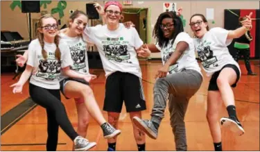  ??  ?? Seventh graders Sabrina Harris, Logan Towarnicki, Olivia Mackethan, Maddi Stone, and Katherine Kummerer during the Dance Marathon.