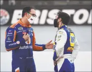  ?? Jared C. Tilton / Getty Images ?? Joey Logano, left, talks with Chase Elliott after the NASCAR Cup Series Food City presents the Supermarke­t Heroes 500 at Bristol Motor Speedway on Saturday.