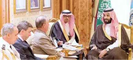  ??  ?? IN ‘LETTER’ AND SPIRIT: Defense Minister Prince Mohammed bin Salman receives a message from his French counterpar­t Jean-Yves Le Drian. The message was handed to him by French Ambassador to the Kingdom Bertrand Besancenot during a meeting in Riyadh on...