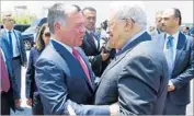  ?? Palestinia­n President’s Office ?? KING ABDULLAH II of Jordan, left, is greeted by Palestinia­n Authority President Mahmoud Abbas.