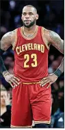  ?? AP file photo ?? LeBron James became an unrestrict­ed free agent at 12:01 a.m. today after declining to exercise his $35.6 million contract option for next season. James could remain in Cleveland, but there are at least three other teams with legitimate shots at landing him.