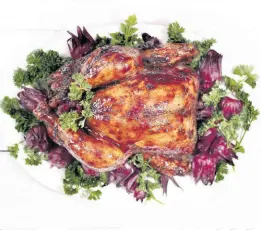  ?? ?? Christmas roast chicken with sorrel-ginger glaze.