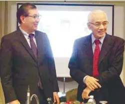  ??  ?? Cheah (left) and GDB Holdings Bhd chairman Tan Sri Zaini Omar at the AGM yesterday.