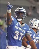  ?? JOE RONDONE/THE COMMERCIAL APPEAL ?? Memphis Tigers defender Jaylon Allen points out to the crowd after covering a kickoff against Arkansas State during their game at Liberty Bowl Memorial Stadium on Saturday, Sept. 5, 2020.