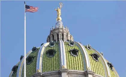  ?? MATT ROURKE/AP ?? The Pennsylvan­ia State Capitol building in Harrisburg.