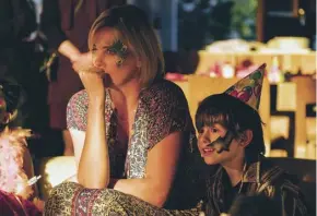  ??  ?? Charlize Theron and Asher Miles Fallica in Tully, directed by Jason Reitman