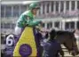  ?? DARRON CUMMINGS — ASSOCIATED PRESS ?? John Velazquez celebrates after riding Sisterchar­lie to victory in the Breeders’ Cup horse race Filly and Mare Turf at Churchill Downs, Saturday, Nov. 3, 2018, in Louisville, Ky.