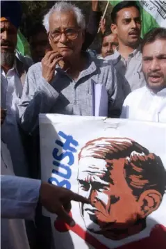  ??  ?? Protesting against George W Bush’s visit to India in 2006 (Getty)