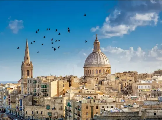  ??  ?? PICTURED ON PREVIOUS SPREAD: A cruise ship at Malta Port
CLOCKWISE FROM TOP LEFT:
Traditiona­l Maltese balconies in Valleta; the Basilica of Our Lady of Mount Carmel and Grand Harbour in Valletta