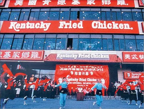  ?? PROVIDED TO CHINA DAILY ?? The first Kentucky Fried Chicken restaurant on the Chinese mainland was opened in the Qianmen area in Beijing on Nov 12, 1987. Yum China has evolved from a single KFC store in Beijing 30 years ago to over 7,900 stores across the country today.