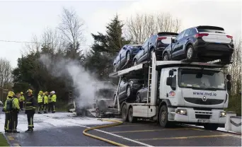  ?? Photo by John Reidy ?? The car transporte­r which caught fire at Dysart Cross outside Castleisla­nd on the Killarney Road on Tuesday morning.