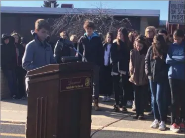  ?? KEVIN MARTIN — THE MORNING JOURNAL ?? Eighth-grader Jackson Bolognia reads a ceremonial proclamati­on at Learwood Middle School’s Pearl Harbor remembranc­e ceremony on Dec. 8 at 340 Lear Road in Avon Lake. Jackson was selected by a group of Learwood teachers and he was joined by Avon Lake’s...