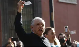  ?? ?? The Mexican president, Andrés Manuel López Obrador, and his wife, Beatriz Gutiérrez Müller, outside a voting booth in Mexico City. Photograph: Luis Barron/Eyepix/Rex/Shuttersto­ck