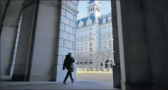  ?? CHIP SOMODEVILL­A/GETTY ?? The Old Post Office Tower, a historic building at 1100 Pennsylvan­ia Ave. NW in Washington, D.C., was still open to the public Friday despite the partial government shutdown.