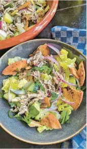  ?? PITTSBURGH POST-GAZETTE GRETCHEN MCKAY/ ?? This version of fattoush includes shredded chicken tossed in a citrusy tahini-sumac dressing.