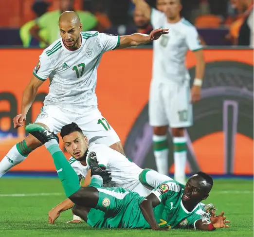  ??  ?? Foul...Senegal’s Sadio Mane is brought down in last year’s Africa Cup of Nations Final against Algeria