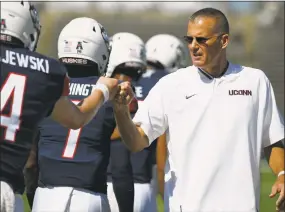  ?? Jessica Hill / Associated Press ?? UConn coach Randy Edsall uses social media to post inspiratio­nal quotes and the names of the game captains among other things on his Twitter feed.