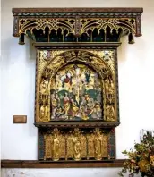  ??  ?? A lavish gilded Flemish Renaissanc­e reredos, or ornamental screen, at the back of the altar inside St Mary’s Church, Cavendish.