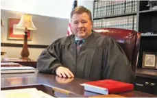  ?? STAFF FILE PHOTO ?? Chattanoog­a Juvenile Court Judge Robert Philyaw poses in his chambers at Hamilton County Juvenile Court. The judge has spoken against a House bill that includes harsher punishment­s for certain juvenile offenders.