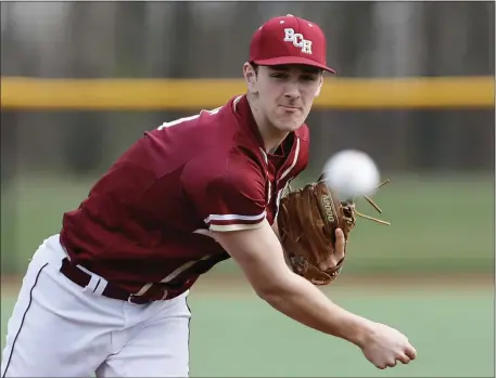  ?? PHOTO BY PAUL CONNORS — MEDIA NEWS GROUP/BOSTON HERALD ?? BC High pitcher Liam Kinneen delivers a pitch against Taunton during the first inning Saturday. BC High earned an impressive 8-1baseball win.