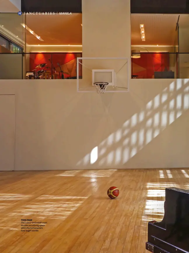  ??  ?? THIS PAGE
The indoor basketball court doubles as a dining space when the homeowners host larger parties