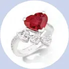  ??  ?? Ring with a 4ct heart-shaped Siamese ruby with diamonds