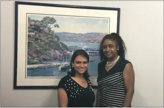  ?? COURTESY OF CUSTOMERS BANK ?? Berjica Mendoza, left, owner of Community Grocery Store and Denise Payne, Small Business Lender with Customers Bank’s Multicultu­ral Banking Team.