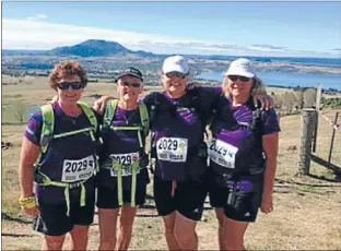  ??  ?? Light walk: Lesley Reece, left, Margaret Kennedy, Kerry Farrant and Jan Bullot tackle the 100km Oxfam trailwalke­r.