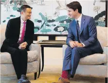  ??  ?? Jack Ma, the founder of Alibaba, talks with Prime Minister Justin Trudeau in Guangzhou on Wednesday.