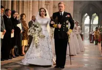  ??  ?? TOP: Then Princess Elizabeth with the Duke of Edinburgh after their wedding. ABOVE: Elizabeth escorted down the aisle by her father, King George VI (Jared Harris) in The Crown.