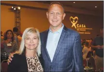  ?? (NWA Democrat-Gazette/Carin Schoppmeye­r) ?? Michelle and Jason Nichol help support CASA Northwest Arkansas at the Light of Hope luncheon Nov. 3 at the Northwest Arkansas Convention Center in Springdale. Jason provided keynote remarks at the benefit.