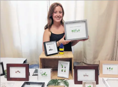  ?? WENDY ELLIOTT ?? The popularity of her sea glass artwork meant Halifax artist Melissa Maciver was running out of stock on July 22.